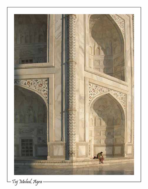 A tourist rests at the Taj Mahal, Agra, India